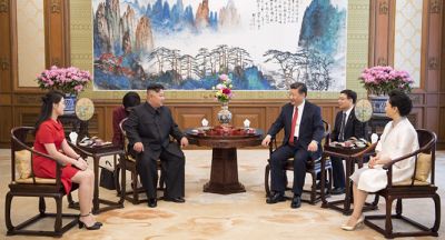习近平会见朝鲜劳动党委员长金正恩